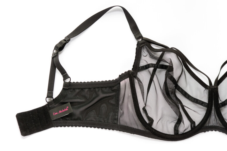 Biustonosz SMN Fetysz Czarny Ewa Michalak - rozłożony na płasko od wewnątrz, widoczny lewy bok z metką